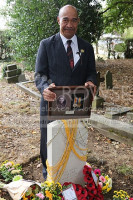 NIUE ISLANDER ALAN TANO with a picture of his GRANDFATHER